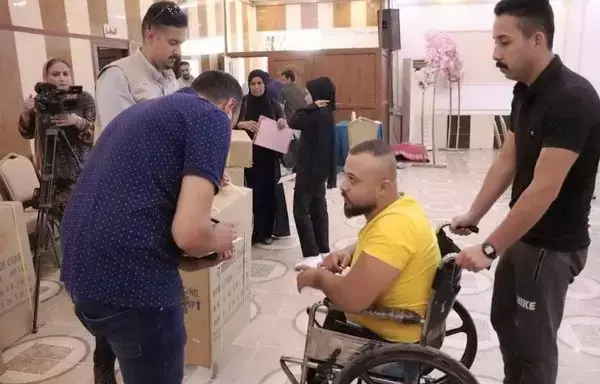 An Iraqi mine victim receives assistance at a government support center in Ninawa province on July 23. [Iraqi Ministry of Environment]