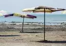 
A picture shows empty tourist facilities by Lake Habbaniyah affected by severe drought in Iraq's Anbar province, on August 11. [Murtadha Ridha/AFP]        