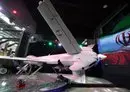 
A picture shows the new Iranian Mohajer-10 drone during Iran's defense industry achievements exhibition in Tehran on August 23. [Atta Kenare/AFP]        