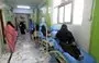 
Yemeni women suffering from cancer sit on makeshift beds in the corridor of the National Oncology Centre in Taez city, on April 29, 2021. [Ahmad al-Basha/AFP]        