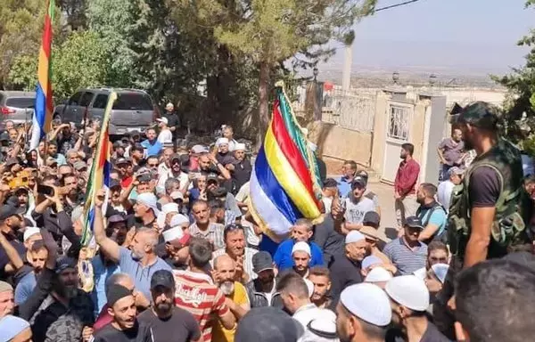 Protesters gather in the city of al-Suwayda in front of a religious leader's house, in this photo posted online August 21. [suwayda24.com]