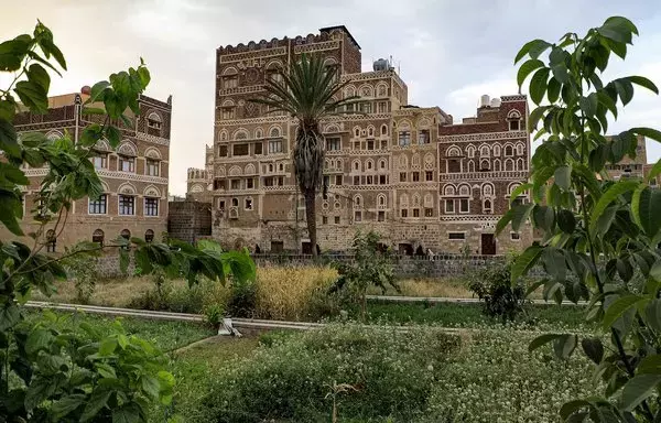 A picture shows a view of UNESCO-listed buildings in the old city of Sanaa on July 12. After nearly a decade of war, Old Sanaa, once full of foreigners seeking its hidden hammams and markets teeming with silver and spices, feels cut off from the world. [Mohammed Huwai/AFP]