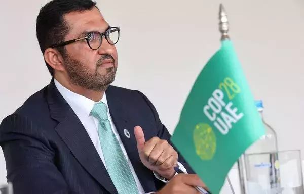 Sultan Al Jaber, chief executive of the UAE's Abu Dhabi National Oil Company (ADNOC) and president of this year's COP28 climate, gestures during an interview as part of the 7th Ministerial on Climate Action (MoCA) in Brussels on July 13. [François Walschaerts/AFP]