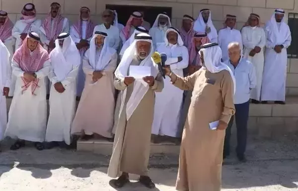 Tribal elders from the northern Syrian city of al-Tabqa announce their support for the Syrian Democratic Forces on September 3, during the recently concluded Operation Security Reinforcement. [Screenshot from an SDF video]