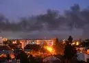 
Black smoke billows over the western Ukrainian city of Lviv on September 19, after a Russian drone attack. [Yuriy Dyachyshyn/AFP]        