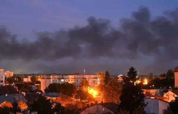 Black smoke billows over the western Ukrainian city of Lviv on September 19, after a Russian drone attack. [Yuriy Dyachyshyn/AFP]