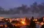 
دخان أسود يتصاعد فوق مدينة لفيف غربي أوكرانيا في 19 أيلول/سبتمبر، بعد هجوم بطائرة روسية مسيرة. [يوري دياشيشين/وكالة الصحافة الفرنسية]        