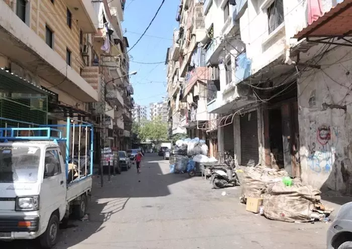 Garbage is piling up in the streets of Tripoli, as waste removal companies are not clearing it, due to the crisis. [Naji Akram/Al-Fassel]