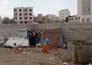 
A family in Sanaa's Bayt Baws district has been residing in this makeshift shelter on an unpaved street. [Yazan Abdul Aziz/Al-Fassel]        