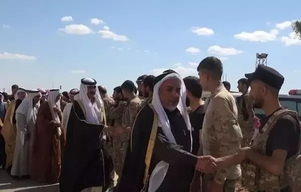 A delegation of the Tabqa tribes visits the Syrian Democratic Forces in the eastern province of Deir Ezzor in a photograph posted online on October 1. [SDF]