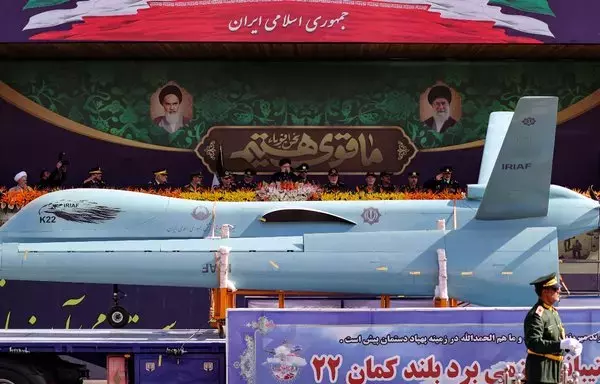 A truck carries an Iranian 'Kaman' drone during the annual military parade in Tehran on September 22. [AFP]