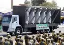 
A truck carries Iranian drones during the annual military parade marking the anniversary of the outbreak of the 1980-1988 war with Iraq, in Tehran on September 22. [AFP]        
