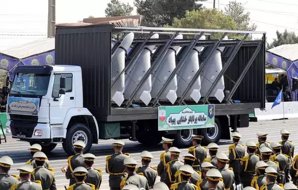 A truck carries Iranian drones during the annual military parade marking the anniversary of the outbreak of the 1980-1988 war with Iraq, in Tehran on September 22. [AFP]
