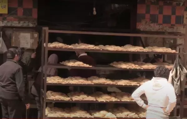 Trays of fresh, subsidized bread are seen here in a screenshot from a video posted online by the Egyptian Ministry of Supply and Internal Trade on May 3, 2022.