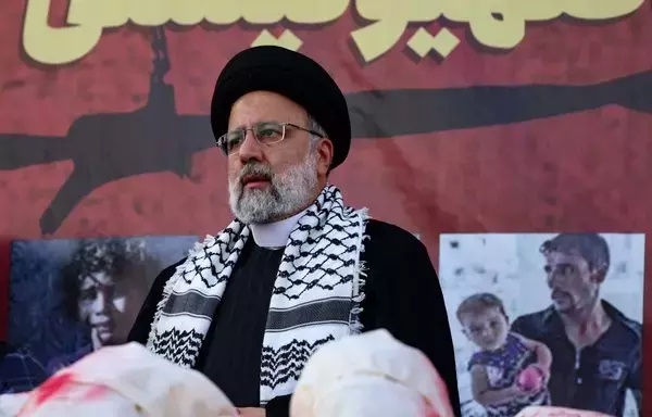 Iranian President Ebrahim Raisi speaks at a pro-Hamas event on October 18. [Atta Kenare/AFP]