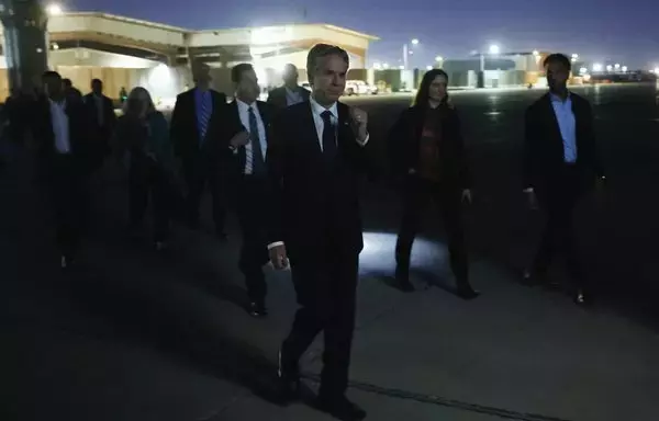 US Secretary of State Antony Blinken walks to board his military transport aircraft to depart Baghdad International Airport after meeting Iraq's prime minister, amid the ongoing conflict between Israel and Hamas, in Baghdad on November 5. [Jonathan Ernst/AFP]