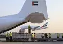 
An Emirates cargo plane is loaded with aid for Gaza at the airport in Dubai before flying to the city of al-Arish in Egypt’s North Sinai province on October 17. [Karim Sahib/AFP]        