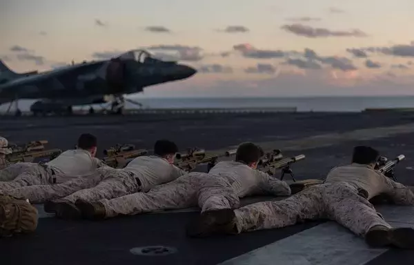 Marines assigned to the 26th Marine Expeditionary Force conduct sniper training aboard the amphibious assault ship USS Bataan in the Gulf of Aden on October 18. [US Marines]