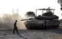 
Israeli tanks and bulldozers deployed along the Israel-Gaza border on November 4. [Yuri Cortez/AFP]        