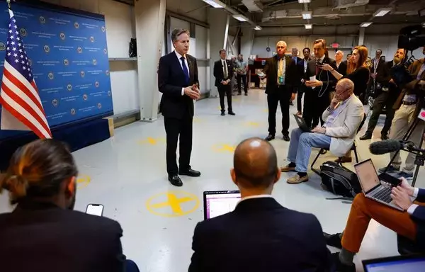 US Secretary of State Antony Blinken speaks with reporters about his meeting with the Iraqi prime minister before departing Baghdad International Airport on November 5. [Jonathan Ernst/Pool/AFP]