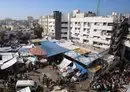 
An aerial view shows the compound of Al-Shifa Hospital in Gaza City on November 7, amid the ongoing battles between Israel and Hamas. [Bashar Taleb/AFP]        