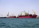 
Ships are docked for unloading in Yemen's Houthi-held port of Hodeida on July 15. [Mohammed Huwais/AFP]        