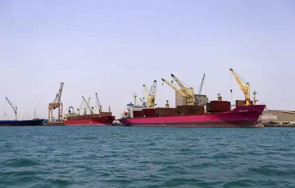 Ships are docked for unloading in Yemen's Houthi-held port of Hodeida on July 15. [Mohammed Huwais/AFP]