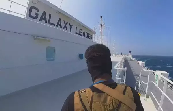 A screen grab from propaganda footage released by the Houthis on November 19 reportedly shows Houthi elements during the capture of the Galaxy Leader, a cargo vessel, in the Red Sea. [Ansarullah Media Centre/AFP]