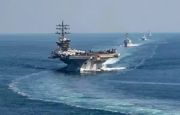 The Dwight D. Eisenhower carrier strike group transits the Strait of Hormuz on November 26. [US Navy]