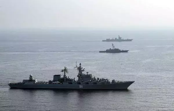 Iranian, Russian and Chinese warships during a joint military drill in the Indian Ocean in January 2022. [Iranian Army office/AFP]