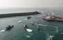 
Iranian ships take part in a military exercise in August, landing forces on the disputed island of Abu Musa. [IRNA]        