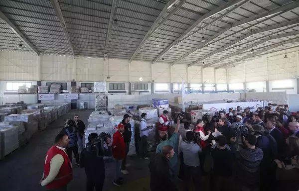 Aid for Gaza is seen in an Egyptian Red Crescent humanitarian society depot during the UN Security Council ambassadors' visit to Rafah on December 11. [Giuseppe Cacace/AFP]