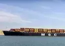 
A container ship transits the Suez Canal off Port Said in this photo, posted to the Suez Canal Authority Facebook page on December 17.        