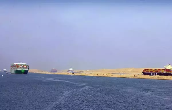 Ships can be seen transiting the New Suez Canal, which doubled the longest parts of the waterway and eased traffic in both directions, in this photo posted to the Suez Canal Authority Facebook page on December 17.