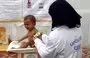 
A UN nurse tends to a malnourished child at a treatment center in Yemen's western province of al-Hodeidah on February 15, 2022. [Photo by Khaled Ziad/AFP]        