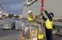 
Close to 90 tons of thermal blankets and other essential items are unloaded from Royal Fleet Auxiliary ship Lyme Bay in Egypt's Port Said in early January as part of the first UK maritime shipment of lifesaving aid to civilians in Gaza. [UK Royal Navy]        