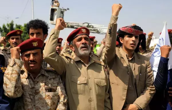 Supporters of Yemen's Iran-backed Houthi group commemorate Eid al-Ghadir in Sanaa on July 6, 2023. [Mohammed Huwais/AFP]