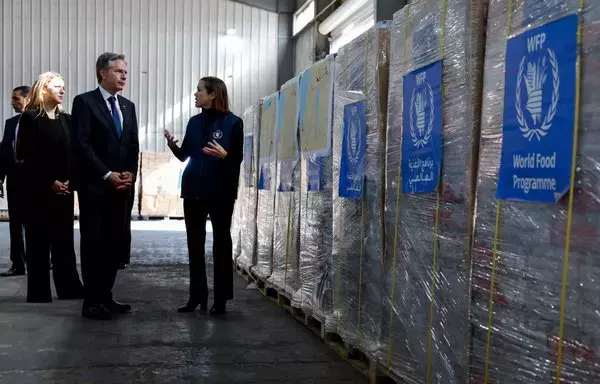 US Secretary of State Antony Blinken visits a World Food Program regional warehouse in Amman on January 7. [Evelyn Hockstein/Pool/AFP]