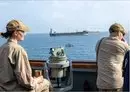 
Sailors aboard a ship from Combined Maritime Forces Task Force 153 survey the maritime environment to promote the free flow of trade in the Red Sea in support of Operation Prosperity Guardian. [Combined Maritime Forces]        