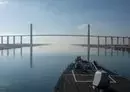 
The Arleigh Burke-class guided-missile destroyer USS Laboon transits the Suez Canal December 18. [USCENTCOM]        