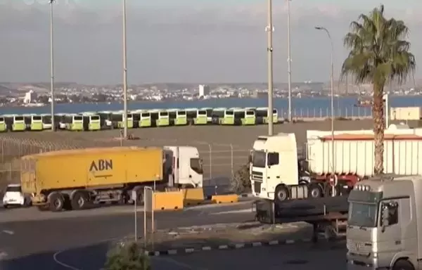 Truckloads of aid are seen on a military base in Cyprus in this January photo. [YJC]