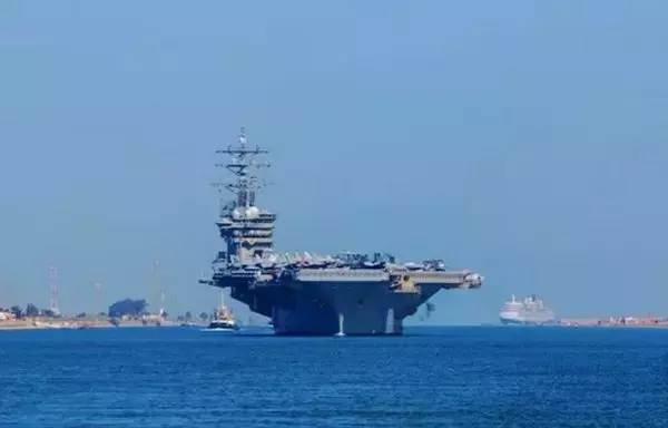 The aircraft carrier USS Dwight D. Eisenhower transits the Suez Canal on November 4, 2023, to reinforce the US Navy's 5th Fleet and help ensure maritime security and stability in the Middle East. [US Navy]