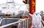 
Immigration inspection officers check an oil tanker carrying imported crude oil at Qingdao port in China's eastern Shandong province on May 9, 2022. [AFP/CHINA OUT]        