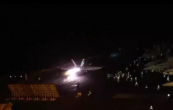 This screenshot from a video posted by the US military's Central Command shows a jet taking off from a carrier as part of ongoing international efforts to respond to increased Houthi destabilizing and illegal activities in the region. [CENTCOM]