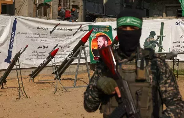 Hamas displays rockets and a military drone during an exhibition organized by the Ezzedine Al-Qassam Brigades in Gaza on December 9, 2022. [Mohammed Abed/AFP]