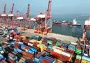 
A cargo ship prepares to berth at the container terminal of Lianyungang Port in China’s eastern Jiangsu Province on December 6. [AFP]        