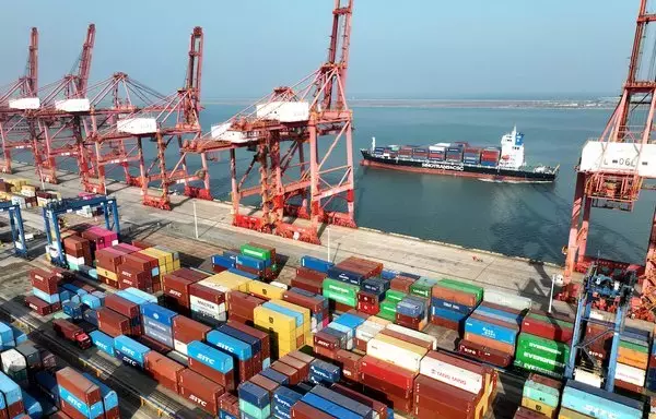 A cargo ship prepares to berth at the container terminal of Lianyungang Port in China’s eastern Jiangsu Province on December 6. [AFP]