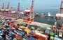 
A cargo ship prepares to berth at the container terminal of Lianyungang Port in China’s eastern Jiangsu Province on December 6. [AFP]        