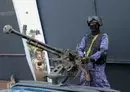 
A Houthi fighter mans a gun during a rally in Sanaa on February 9. [Mohammed Huwais/AFP]        