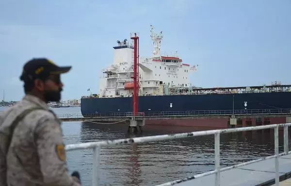 A Russian cargo ship carrying crude oil is seen in the dock in Karachi, Pakistan, on June 28. [Rizwan Tabassum/AFP]